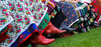 horizontal color image of traditional polish costumes