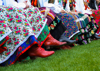 horizontal color image of traditional polish costumes